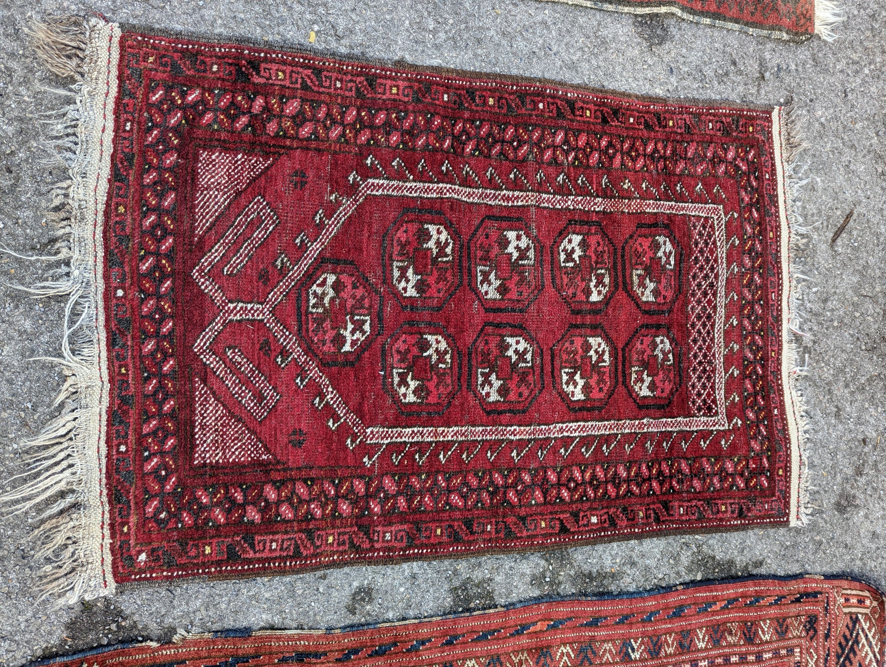 Three Bokhara rugs, largest 134 x 84cm